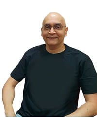 posed portrait photo of Arvind